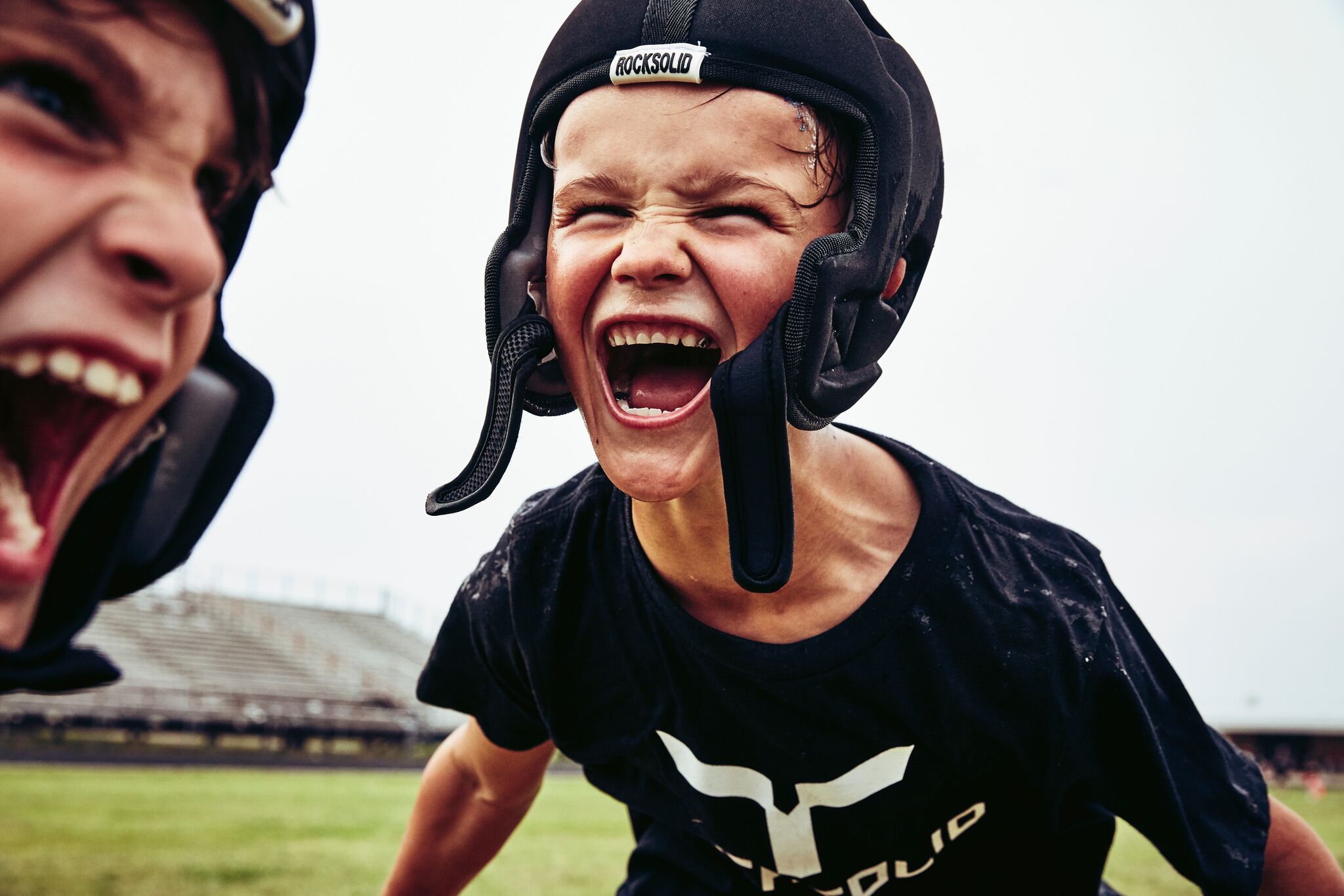 Young athletes in Rocksolid headgear bringing energy to summer camp